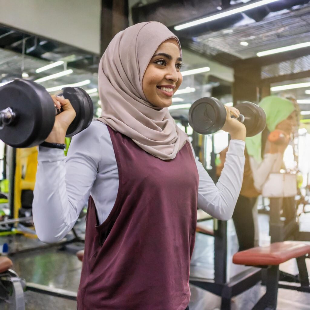 Women lifting heavy weights in the gym